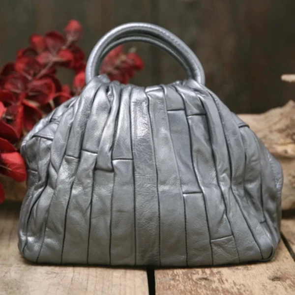 Sac à main femme brillant en cuir souple description